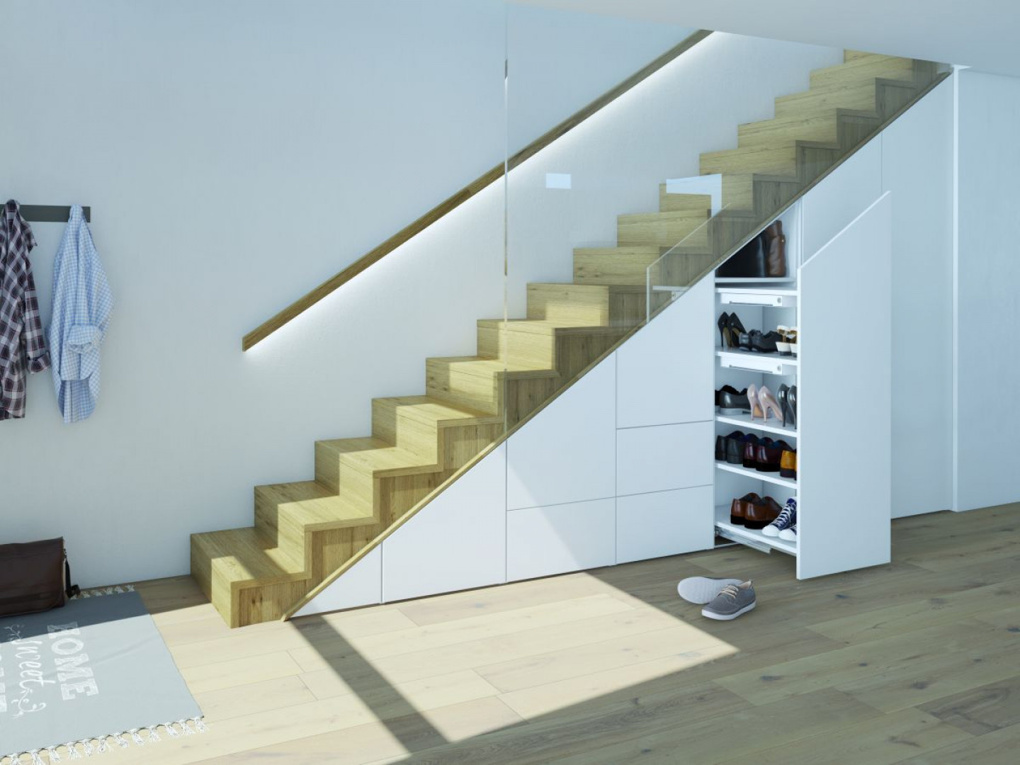 Zabudowując odpowiednio przestrzeń pod schodami, można tam stworzyć wiele praktycznych miejsc do przechowywania. Fot. Hettich